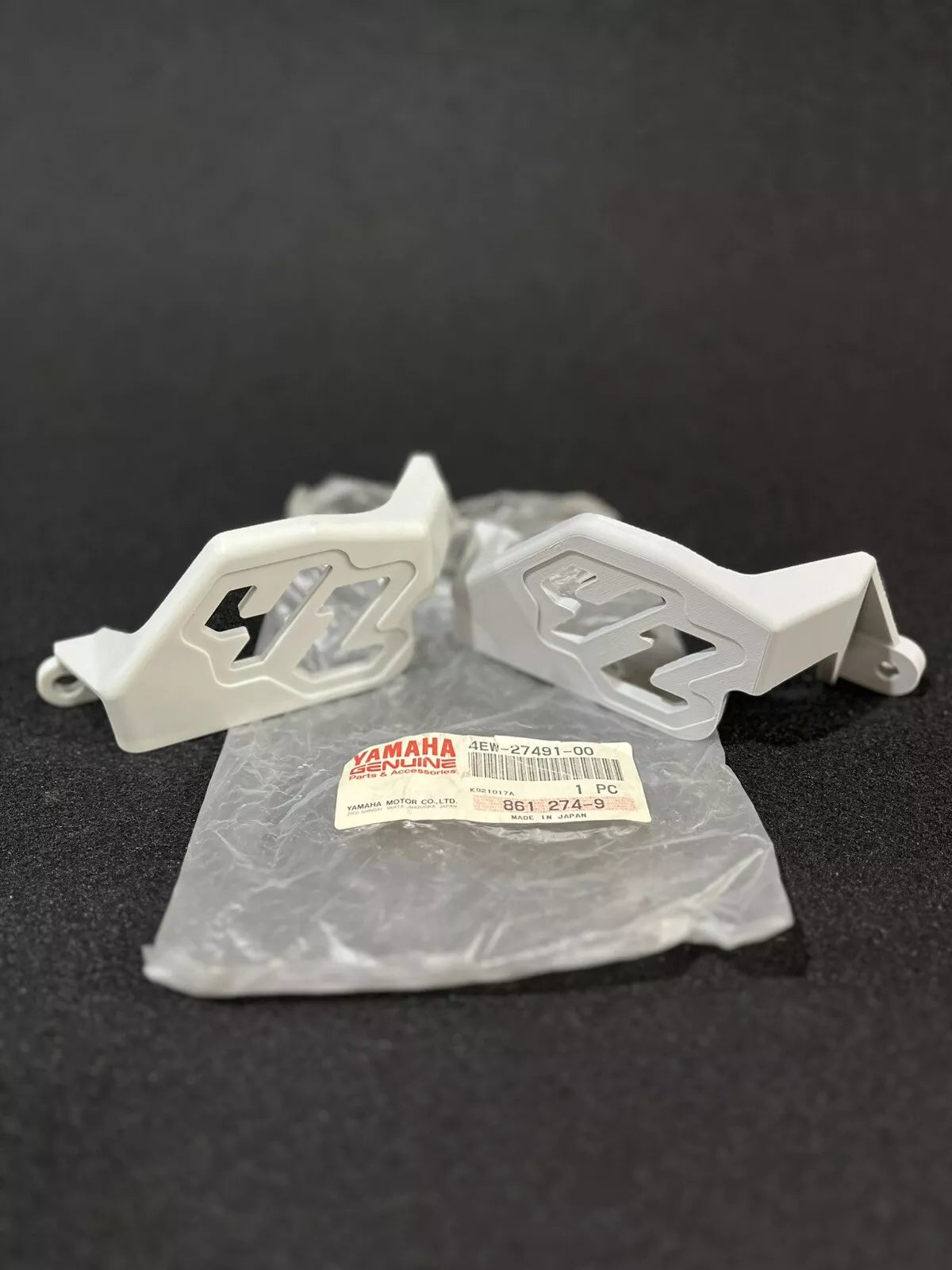 1993-2002 Yamaha YZ250 YZ125 Rear Brake Caliper Guard OEM Part No. 4EW-27491-00